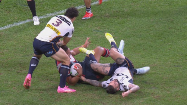 Adam Reynolds lays flat after an ugly tackle.