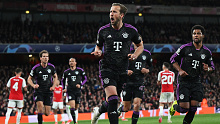 Harry Kane of Bayern Munich celebrates scoring his team's second goal from a penalty.