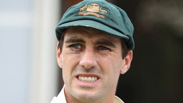 Australian skipper Pat Cummins looks on.