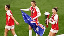 Australian Matildas and Arsenal teammates Caitlin Foord, Kyra Cooney-Cross and Steph Catley celebrate winning the FA Women's League Cup final in 2024.