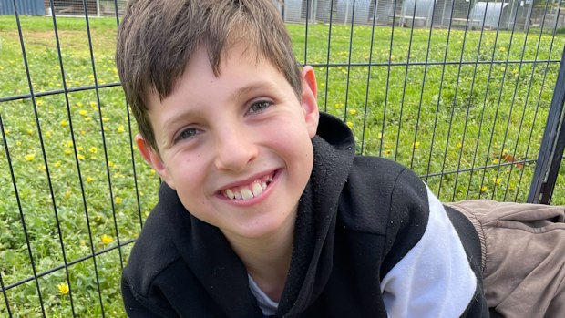 Davey was one of five children seated at a picnic table outside the Melbourne school.