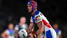 Kalyn Ponga passing the ball. (Photo by Hannah Peters/Getty Images)
