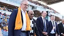 Anthony Albanese, Prime Minister of Australia and Sitiveni Rabuka, Prime Minister of Fiji walk out with Brett Robinson and Daniel Herbert. 