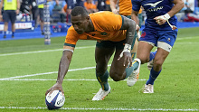 Australia's Suliasi Vunivalu scores a try during a Rugby World Cup warm-up against France.