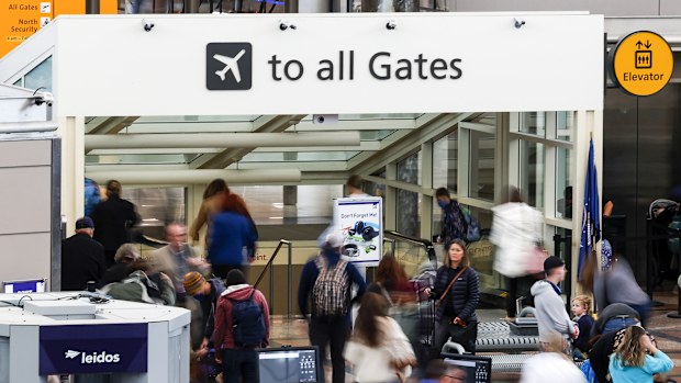 DENVER, CO - FEBRUARY 22: Travelers head toward their gates after passing through a TSA security checkpoint during a winter storm at Denver International Airport on February 22, 2023 in Denver, Colorado. More than 1000 flights have been canceled across the U.S. as the storm impacts travel around the country. (Photo by Michael Ciaglo/Getty Images)