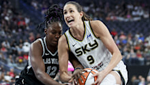 Rebecca Allen of the Chicago Sky drives against Chelsea Gray of the Las Vegas Aces.