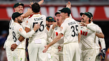 Australia celebrates a wicket.