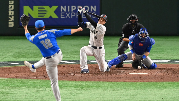 Shohei Ohtani #16 of Japan strikes out in the eighth inning during the World Baseball Classic quarterfinal between Italy and Japan at Tokyo Dome on March 16, 2023 in Tokyo, Japan. (Photo by Kenta Harada/Getty Images)