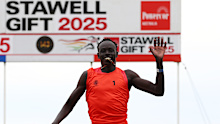 Gout Gout celebrates winning his heat of the men's 120 metres at the 2025 Stawell Gift.