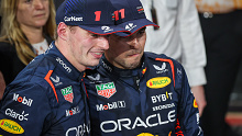 Perez and Verstappen embrace in parc ferme.