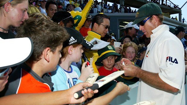 Matthew Hayden of Australia signs autographs during day three of the First Test between Australia and Bangladesh played at Marrara Oval July 20, 2003 in Darwin, Australia. (Photo by Hamish Blair/Getty Images)