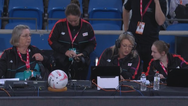 Officials conducting a score check after mistakenly awarding the Lightning a one-point Super Netball victory over the Giants. The match was actually a draw.