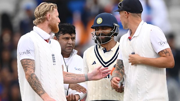England captain Ben Stokes speaks with India batsman Ravindra Jadeja.