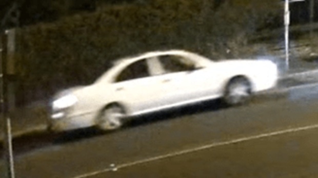 The car is believed to be an early 2000s white Nissan Pulsar.