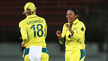 SYDNEY, AUSTRALIA - FEBRUARY 10: Alana King of Australia celebrates with Phoebe Litchfield of Australia after dismissing Sinalo Jafta of South Africa during game three of the women's One Day International series between Australia and South Africa at North Sydney Oval on February 10, 2024 in Sydney, Australia. (Photo by Cameron Spencer/Getty Images)