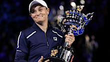 Ash Barty of Australia holds the Daphne Akhurst Memorial Cup after defeating Danielle Collins of the U.S., in the women's singles final at the Australian Open tennis championships in Saturday, Jan. 29, 2022, in Melbourne, Australia. 