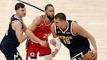 Nikola Jokic and Ben Simmons tussle in the playoffs. 