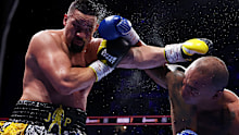 Joseph Parker (L) and Fabio Wardley punch on during their heavyweight fight.