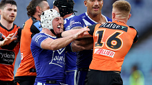 SYDNEY, AUSTRALIA - MAY 04: Reed Mahoney of the Bulldogs clashes with Alex Seyfarth of the Tigers during the round nine NRL match between Canterbury Bulldogs and Wests Tigers at Accor Stadium, on May 04, 2024, in Sydney, Australia. (Photo by Brendon Thorne/Getty Images)