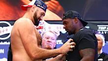LONDON, ENGLAND - APRIL 22: Tyson Fury (L) and Dillian Whyte (R) face-off during the weigh in prior to their WBC heavyweight championship fight at BOXPARK on April 22, 2022 in London, England. (Photo by Mikey Williams/Top Rank Inc via Getty Images)