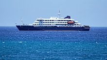 The MV Hondius cruise ship is anchored at a port in Praia, Cape Verde.