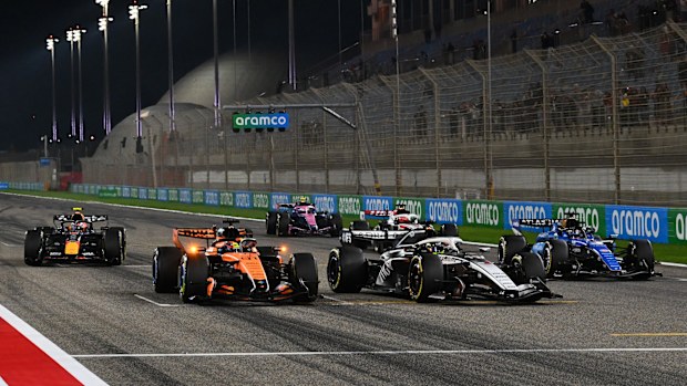 McLaren's Oscar Piastri, Cadillac's Sergio Perez, and Williams' Alex Albon practice launch procedures.