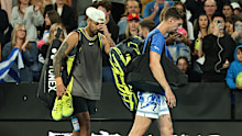 MELBOURNE, AUSTRALIA - JANUARY 16: Nick Kyrgios and Thanasi Kokkinakis of Australia look dejected as they leave John Cain Arena after retiring in the Men's Doubles First Round match against James Duckworth and Aleksandar Vukic of Australia during day five of the 2025 Australian Open at Melbourne Park on January 16, 2025 in Melbourne, Australia. (Photo by Cameron Spencer/Getty Images)