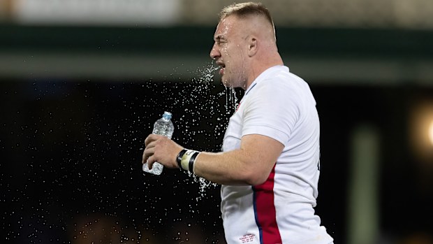 Joe Heyes of England has a drink at the Sydney Cricket Ground.