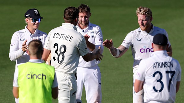 Ben Stokes of England shakes hands with Tim Southee of New Zealand as he walks out to the middle during day one of the Third Test Match in the series between New Zealand and England at Seddon Park on December 14, 2024 in Hamilton, New Zealand. (Photo by Phil Walter/Getty Images)