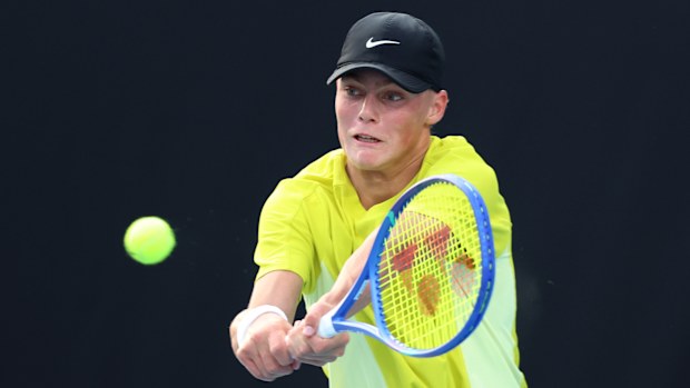 Cruz Hewitt of Australia plays a backhand against Jan Kumstat of Czech Republic.