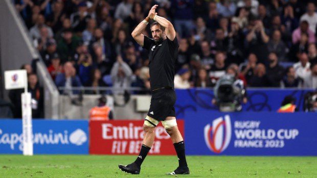 Sam Whitelock of New Zealand applauds the fans as he leaves the field.