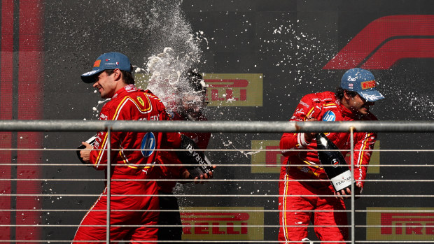 Race winner Charles Leclerc of Monaco and Ferrari and Second placed Carlos Sainz of Spain and Ferrari celebrate on the podium after the F1 Grand Prix of United States at Circuit of The Americas on October 20, 2024 in Austin, Texas. (Photo by Jared C. Tilton/Getty Images)