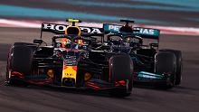 Max Verstappen and Lewis Hamilton in action in Abu Dhabi.