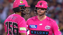 Steve Smith speaks to Babar Azam.