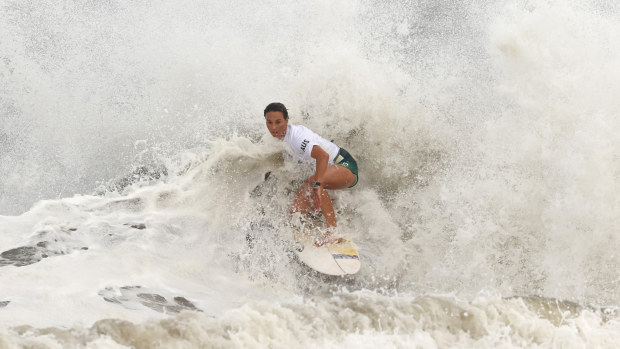 Sally Fitzgibbons of Team Australia surfs during the women's Quarter Final.