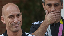 Former President of Spain's football federation, Luis Rubiales, left, stands next to former Spain women's coach Jorge Vilda.