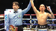 Kazuto Ioka celebrates his victory against Kosei Tanaka.