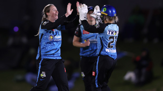 Amanda-Jade Wellington of the Adelaide Strikers  celebrates with Bridget Patterson of the Adelaide Strikers bowling for 1 run Kim Garth of the Melbourne Stars during the WBBL match between Adelaide Strikers and Melbourne Stars at Karen Rolton Oval, on October 21, 2023, in Adelaide, Australia. (Photo by Sarah Reed/Getty Images)