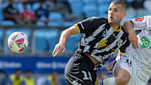 , SYDNEY, AUSTRALIA - NOVEMBER 24: Guillermo May of Auckland shoots for goal is defended by Macarthurs Dino Arslanagic during the round five A-League Men match between Macarthur FC and Auckland FC at Allianz Stadium, on November 24, 2024, in Sydney, Australia. (Photo by Steve Christo - Corbis/Corbis via Getty Images)