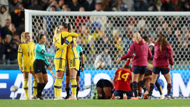 Rebecka Blomqvist and Kosovare Asllani of Sweden shows dejection after the teams 1-2 defeat and progression to the third place play-off match following the FIFA Women's World Cup Australia & New Zealand 2023 Semi Final match between Spain and Sweden at Eden Park on August 15, 2023 in Auckland, New Zealand. (Photo by Hagen Hopkins/Getty Images)