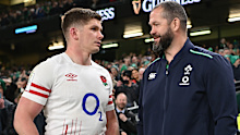 Owen Farrell of England speaks with Andy Farrell of Ireland.