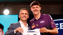 MELBOURNE, AUSTRALIA - NOVEMBER 20: Connor O'Sullivan is seen with Joel Selwood after being selected at number 11 by the Geelong Cats during the 2023 AFL Draft at Marvel Stadium on November 20, 2023 in Melbourne, Australia. (Photo by Michael Willson/AFL Photos via Getty Images)