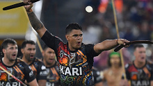 Latrell Mitchell of the Indigenous All Stars leads the Indigenous 'War Cry' before the NRL All Stars game in 2021.