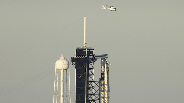 A SpaceX Falcon 9 rocket with a crew of four aboard the Crew Dragon spacecraft scrubbed prior to liftoff for a mission to the International Space Station from pad 39A at the Kennedy Space Center in Cape Canaveral, Florida.