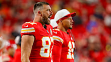 Travis Kelce of the Kansas City Chiefs and Patrick Mahomes of the Kansas City Chiefs watch second quarter game action during the NFL Preseason 2025 game between Chicago Bears and Kansas City Chiefs at Arrowhead Stadium on August 22, 2025 in Kansas City, Missouri. (Photo by David Eulitt/Getty Images)