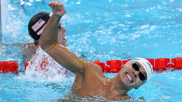 David Popovici of Team Romania celebrates after winning gold in the Mens 200m Freestyle Final 