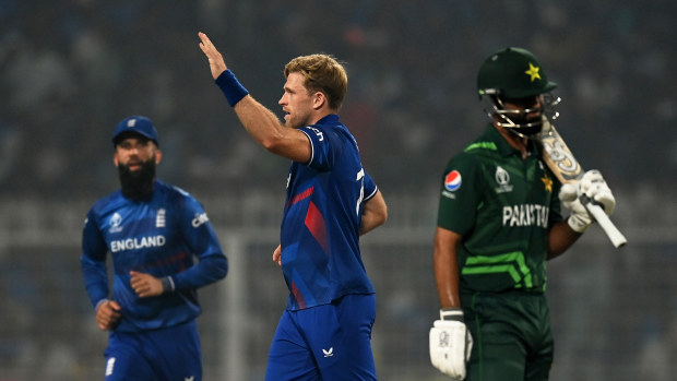 KOLKATA, INDIA - NOVEMBER 11: David Willey of England celebrates the wicket of Fakhar Zaman of Pakistan during the ICC Men's Cricket World Cup India 2023 between England and Pakistan at Eden Gardens on November 11, 2023 in Kolkata, India. (Photo by Gareth Copley/Getty Images)
