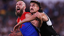 Max Gawn of the Demons competes with Ivan Soldo of the Power.