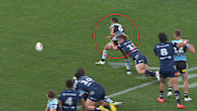 Reuben Cotter tackles Braydon Trindall without the ball.