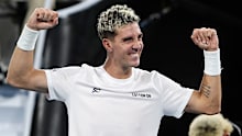 ADELAIDE, AUSTRALIA - JANUARY 11:  Thanasi Kokkinakis of Australia defeats Andrey Rublev during day three of the 2023 Adelaide International at Memorial Drive on January 11, 2023 in Adelaide, Australia. (Photo by Sarah Reed/Getty Images)